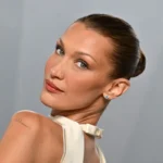Bella Hadid Channels Pamela Anderson’s Iconic Bombshell Updo with New Campaign Hairstyle