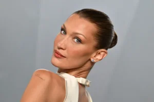 Bella Hadid Channels Pamela Anderson’s Iconic Bombshell Updo with New Campaign Hairstyle