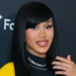 Cardi B Channels Rainbow Brite in a Dazzling Purple Ombre Halter Dress and Vibrant Rainbow Updo
