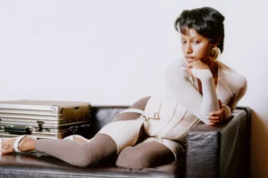 George Riley Fronts RIMOWA Classic Titanium Campaign, Blending Artistry with Global Travel Demands