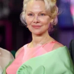 Pamela Anderson Channels 1970s Glamour with Feathered Platinum Lob at Fashion Trust U.S. Awards