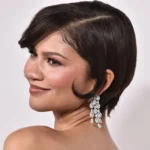Zendaya Stuns in Dramatic Schiaparelli Gown and Ethereal Blue Makeup at "The Drama" Premiere