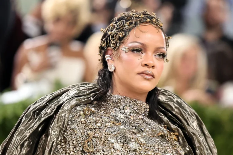 Rihanna Dominates the Met Gala with a Dazzling Metallic Masterpiece and Makeup Innovation