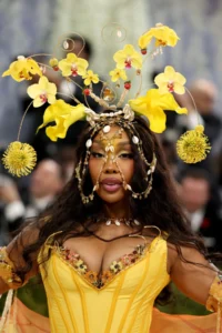 SZA’s Radiant Golden Hour: A Met Gala Masterpiece of Upcycled Elegance and Luminous Beauty