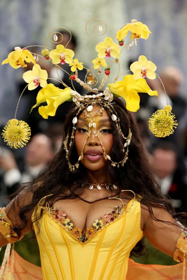 SZA’s Radiant Golden Hour: A Met Gala Masterpiece of Upcycled Elegance and Luminous Beauty