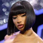 Megan Thee Stallion Dazzles Miami Swim Week with Electrifying Neon Green Updo