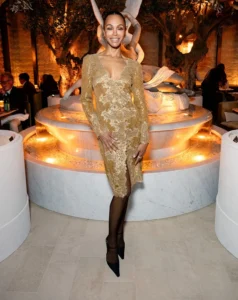 Zoe Saldana Attends RH Milan Gallery Unveiling in Saint Laurent Cassandra Button Lace Dress