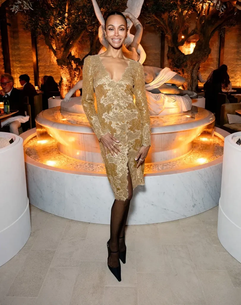 Zoe Saldana Attends RH Milan Gallery Unveiling in Saint Laurent Cassandra Button Lace Dress