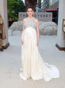 Anne Hathaway Debuts Custom Prada Maternity Gown at The Odyssey New York Premiere