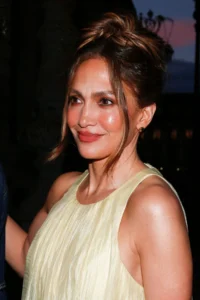 Jennifer Lopez Elevates Paris Haute Couture Fashion Week with a Signature Bow-Adorned Hairstyle
