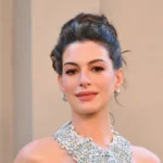 Anne Hathaway Ignites a Beauty Renaissance With the Return of the Classic Red Lip and Matching Manicure