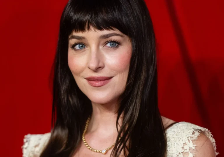 Dakota Johnson redefines red carpet styling by coordinating her manicure with her lingerie in a daring fashion statement
