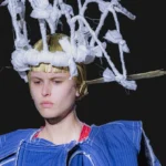 Comme des Garçons Spring/Summer 2027 Paris Fashion Week Showcase Subverts Monochromatic Resistance With Sculptural Royal Satire