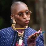 Cynthia Erivo brings a vibrant touch of Oz to Paris Fashion Week with an avant-garde multicolored croc-textured manicure